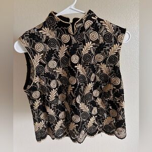 Gold and black blouse